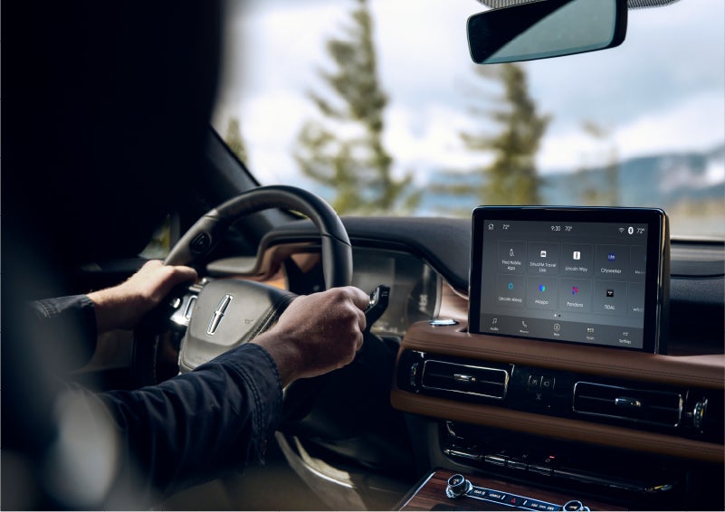 The Lincoln+Alexa app screen is displayed in the center screen of a 2023 Lincoln Aviator® Grand Touring SUV | Holmes Tuttle Lincoln in Tucson AZ