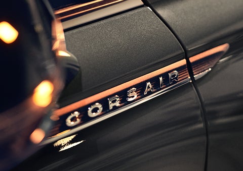 The stylish chrome badge reading “CORSAIR” is shown on the exterior of the vehicle. | Holmes Tuttle Lincoln in Tucson AZ